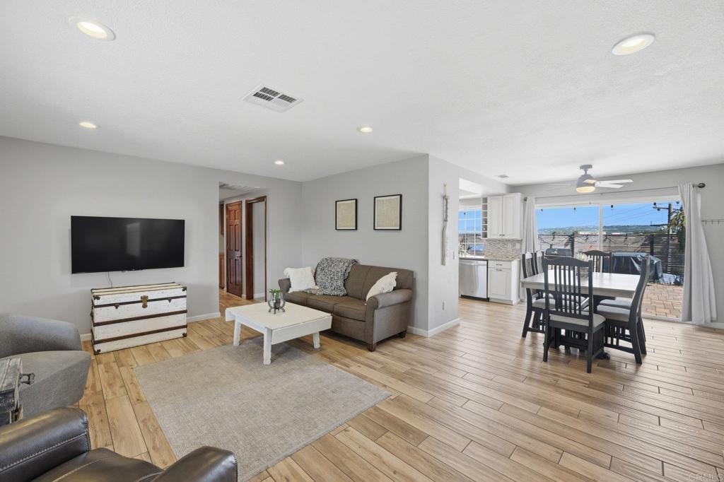 37875 Sage Road Hemet, CA 92544 - Photo 6 of 33 a living room with furniture and a flat screen tv