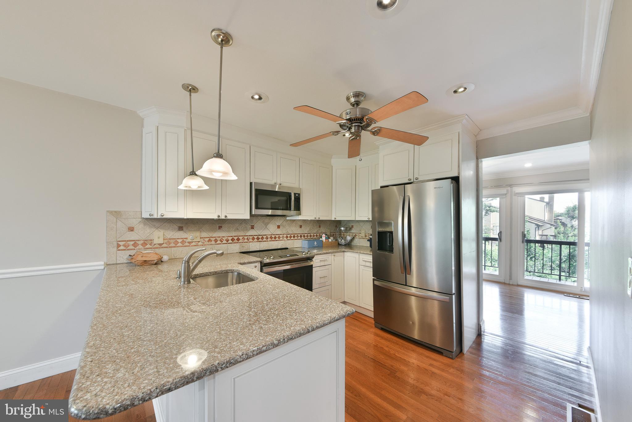 3403 Honey Run Road Ambler, PA 19002 - Photo 11 of 35 a kitchen with a refrigerator a sink and a stove