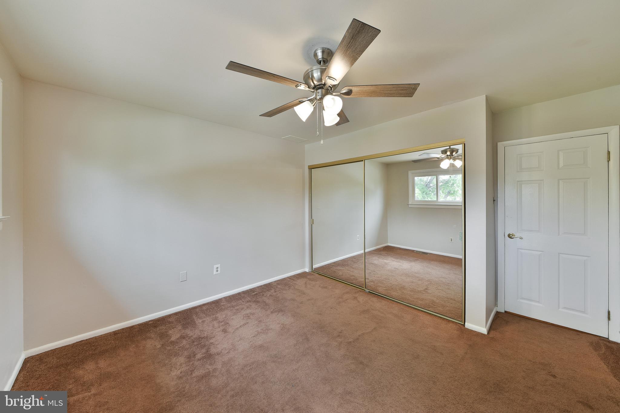 3403 Honey Run Road Ambler, PA 19002 - Photo 16 of 35 an empty room with fan and windows