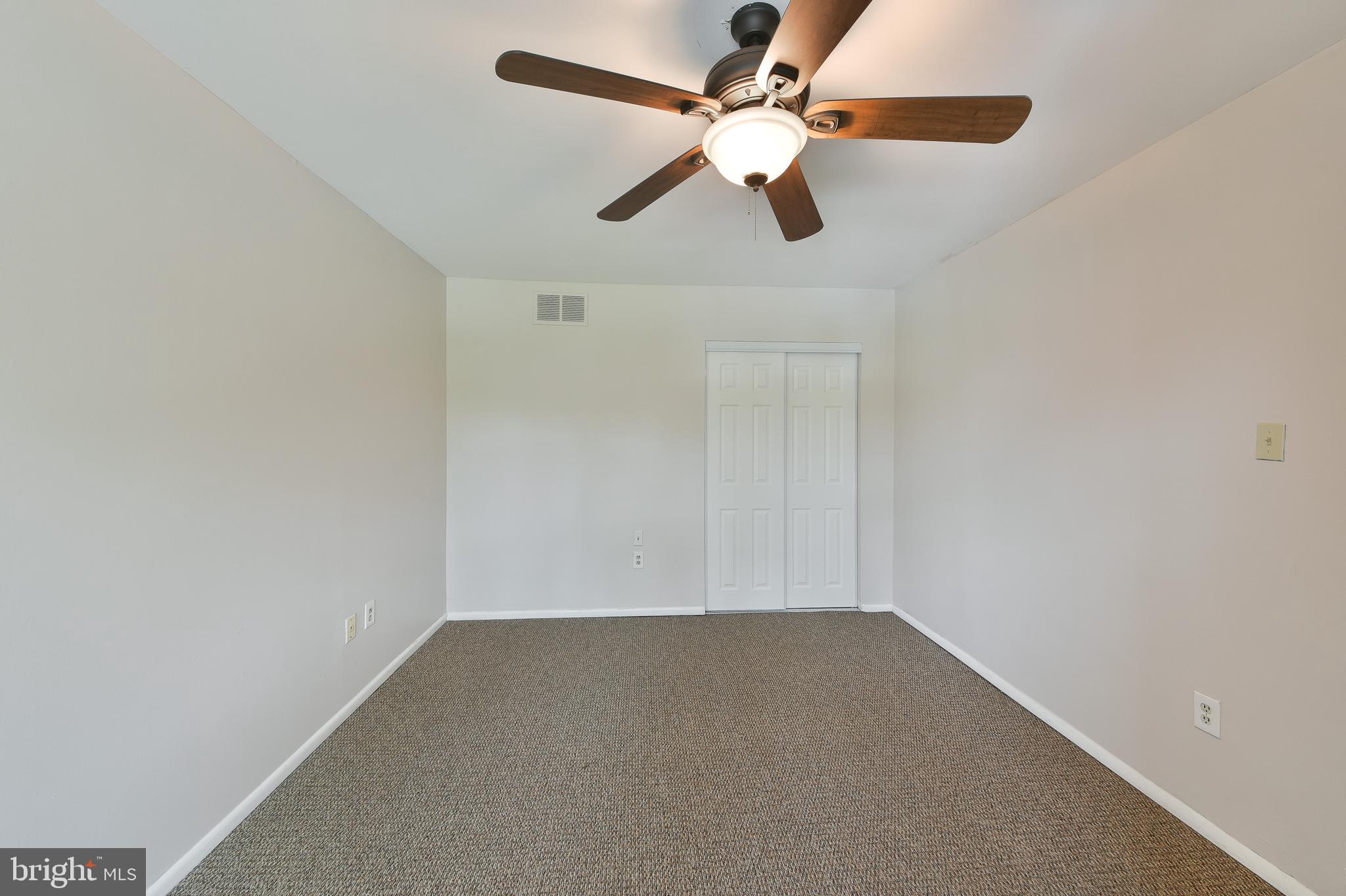 3403 Honey Run Road Ambler, PA 19002 - Photo 19 of 35 an empty room with a window and a fan