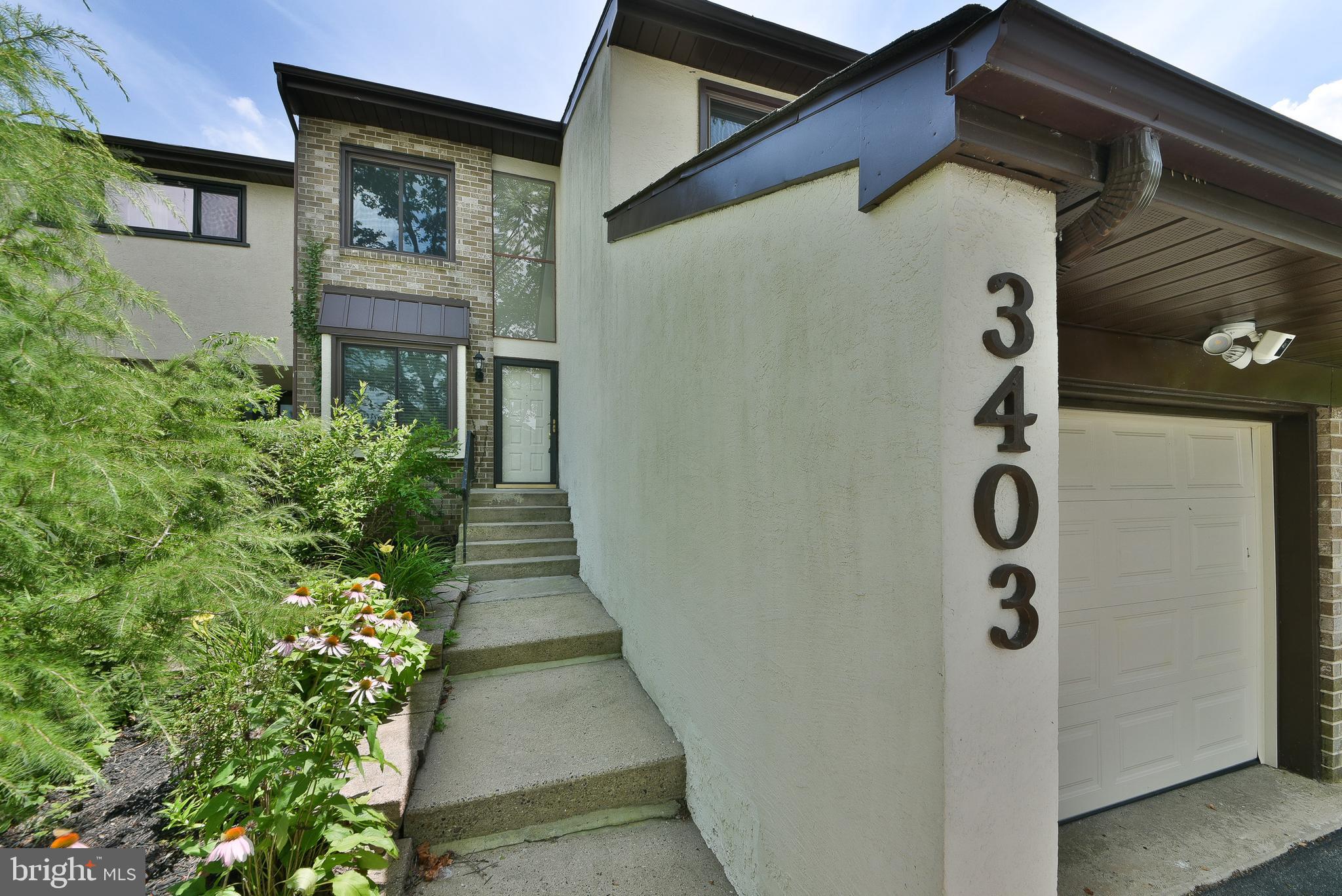 3403 Honey Run Road Ambler, PA 19002 - Photo 2 of 35 a front view of a house with a yard