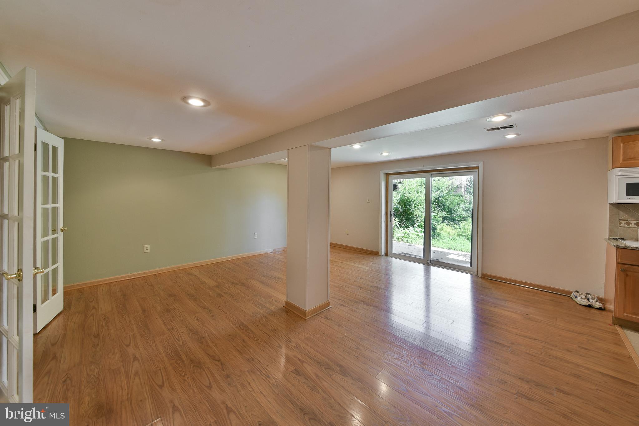 3403 Honey Run Road Ambler, PA 19002 - Photo 26 of 35 a view of an empty room with wooden floor and a window