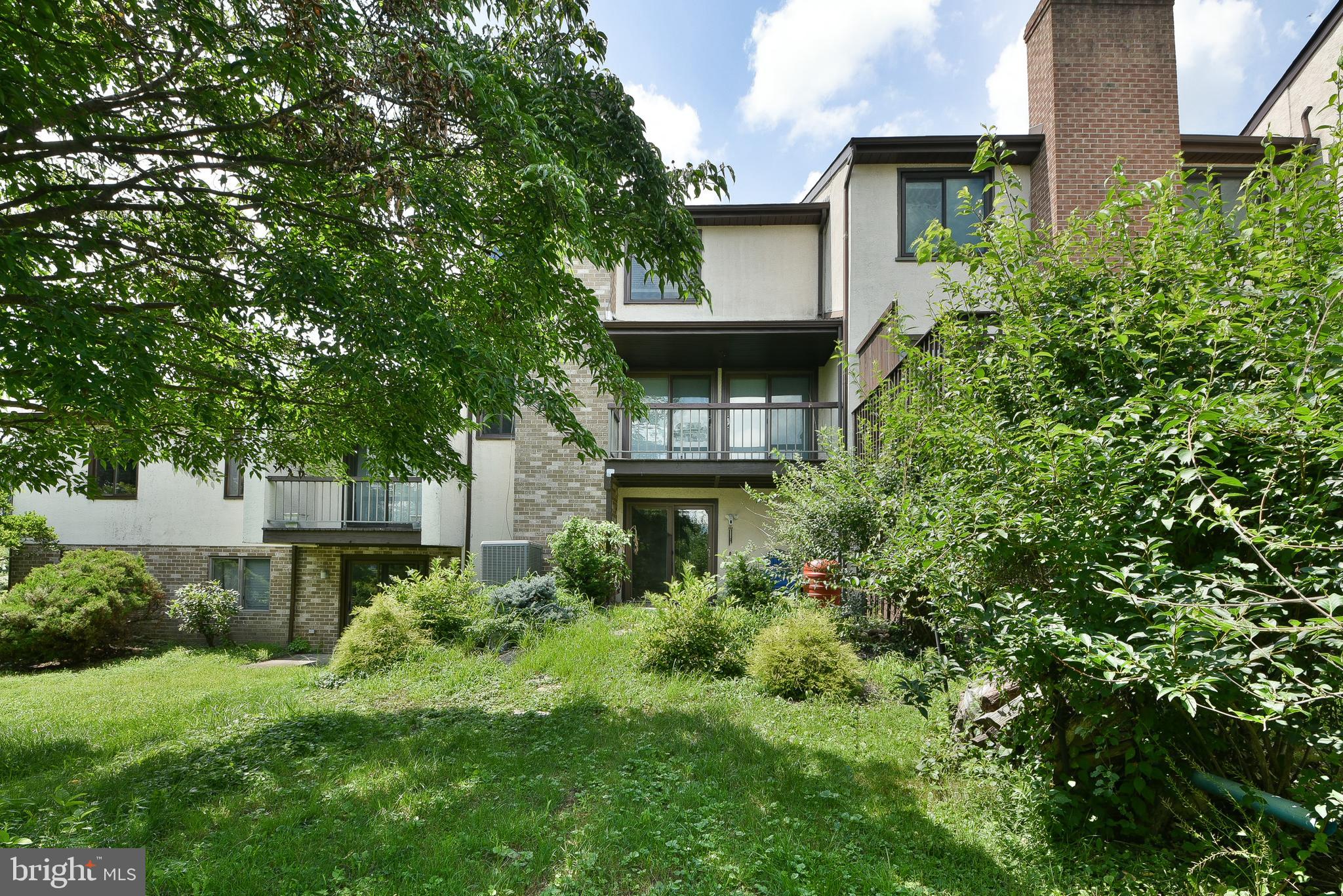 3403 Honey Run Road Ambler, PA 19002 - Photo 31 of 35 front view of a house with a small yard