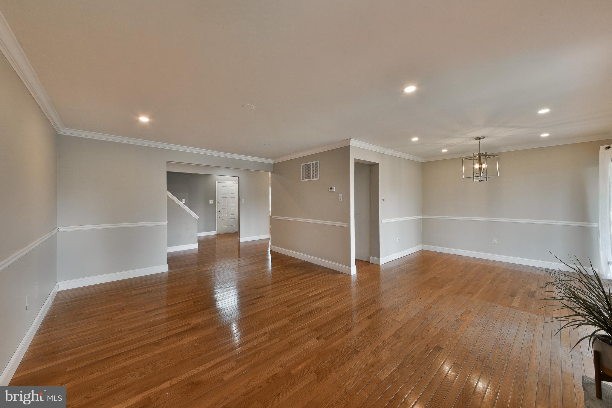 3403 Honey Run Road Ambler, PA 19002 - Photo 6 of 35 a view of an empty room with wooden floor and a window