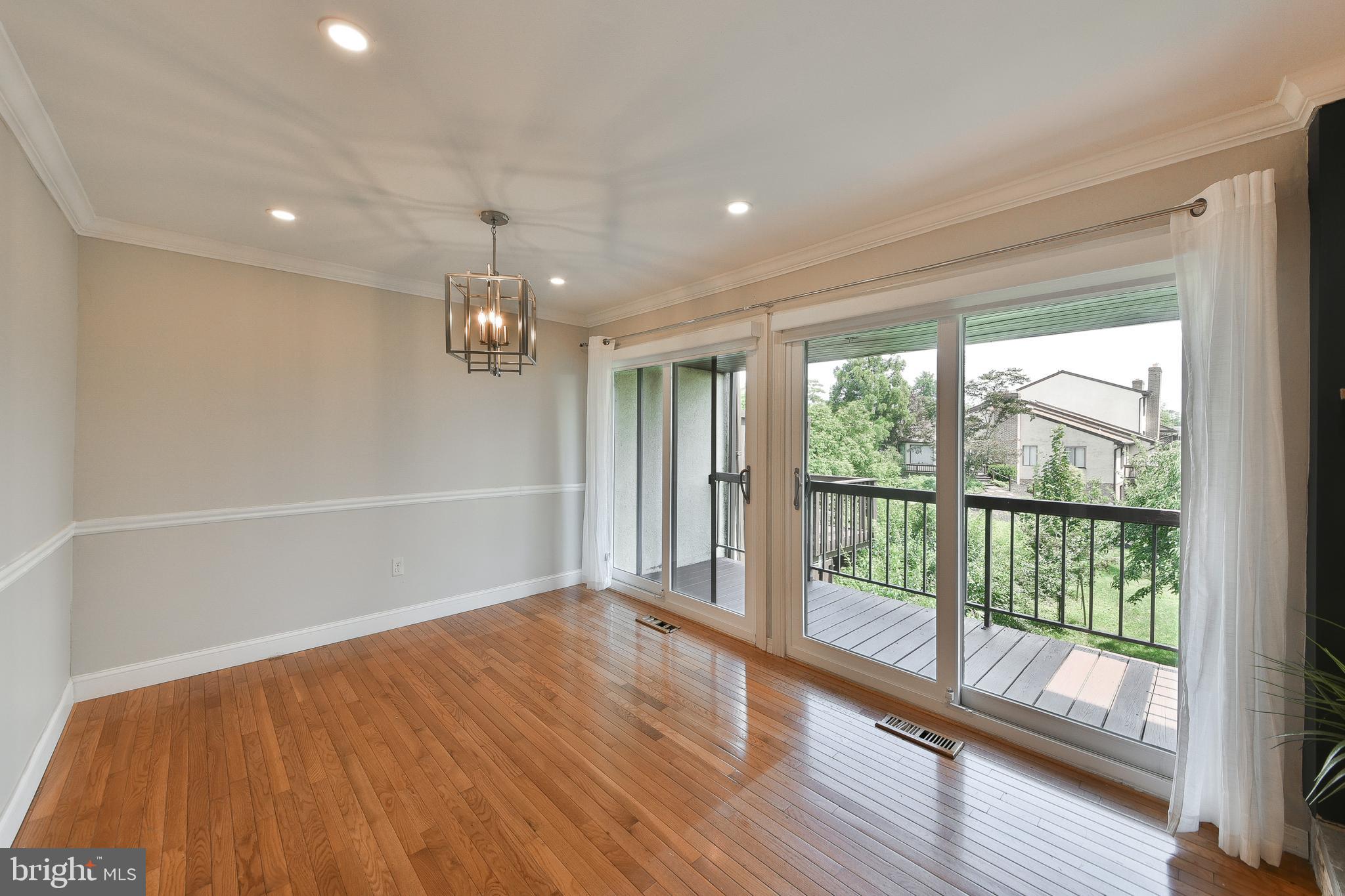 3403 Honey Run Road Ambler, PA 19002 - Photo 8 of 35 wooden floor in an empty room with a window