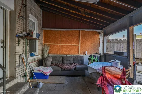 a outdoor living space with patio furniture