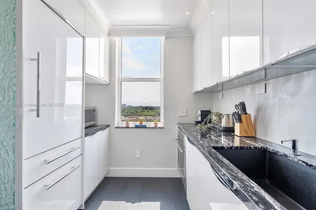 a living room with furniture wooden floor and a table