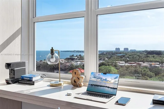 a view of a bathroom with a glass door and a glass door