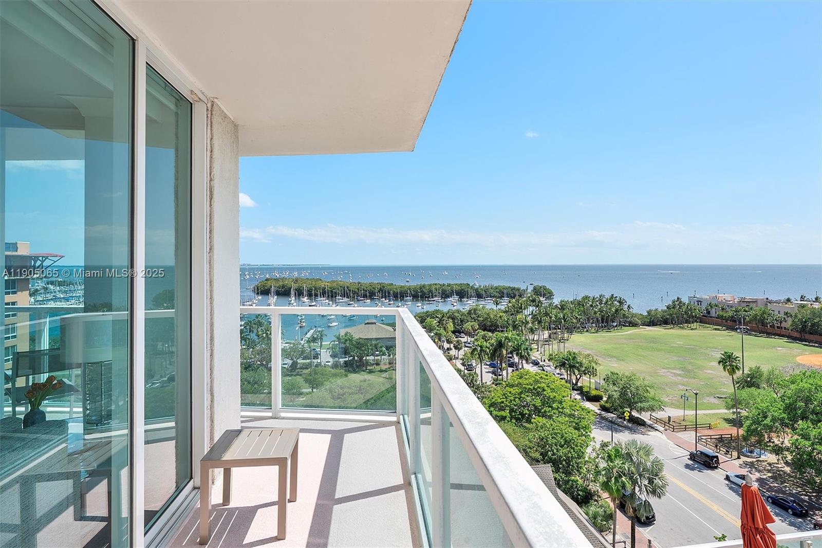 2889 McFarlane Road, Unit 902 Miami, FL 33133 - Photo 58 of 62 a view of a city from a balcony