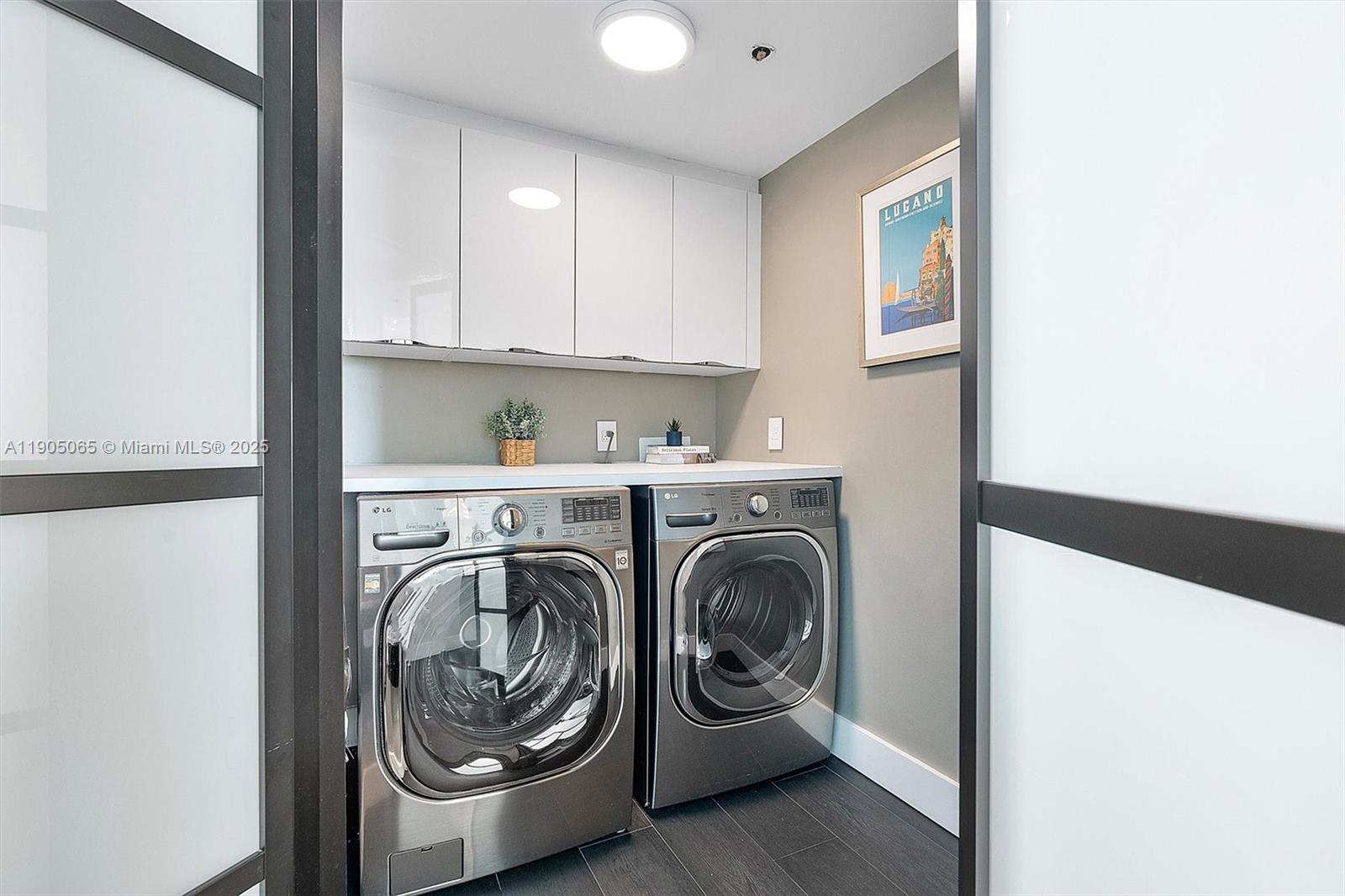 2889 McFarlane Road, Unit 902 Miami, FL 33133 - Photo 61 of 62 a utility room with sink dryer and washer