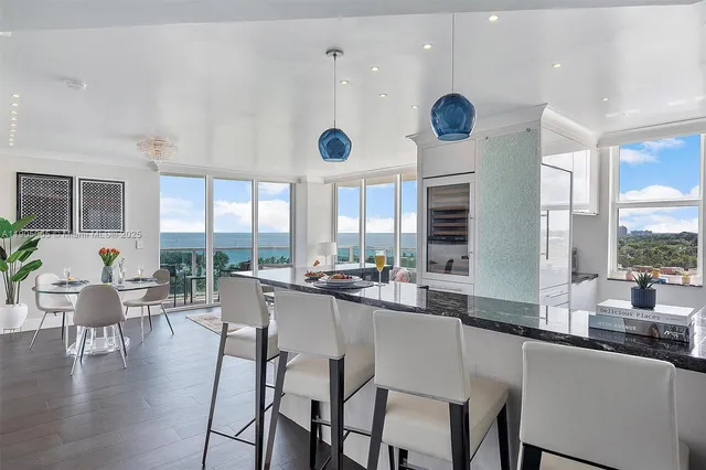 a bedroom with a large bed and a couch