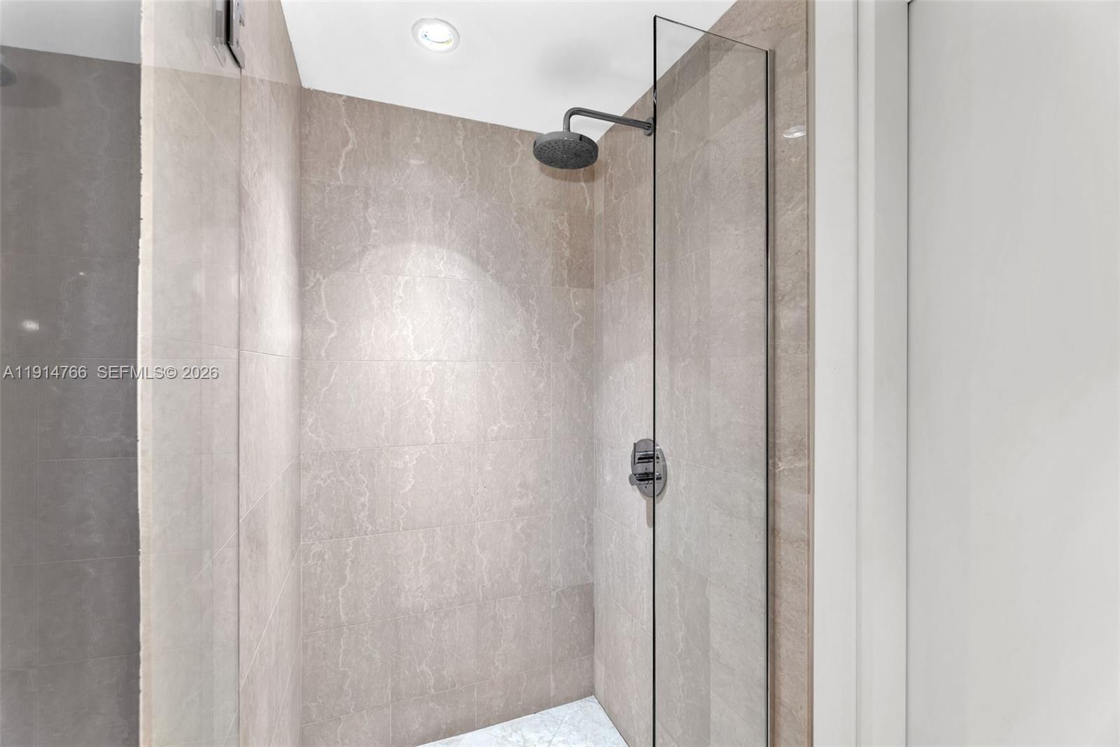 200 Biscayne Blvd Way, Unit 4408 Miami, FL 33131 - Photo 23 of 36 a bathroom with a shower