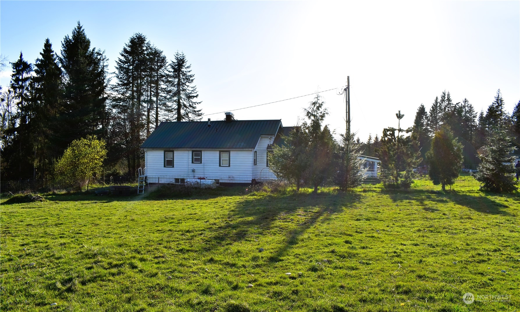 3370 Sweet Road Blaine, WA 98230 - Photo 16 of 20 a view of a house with a yard