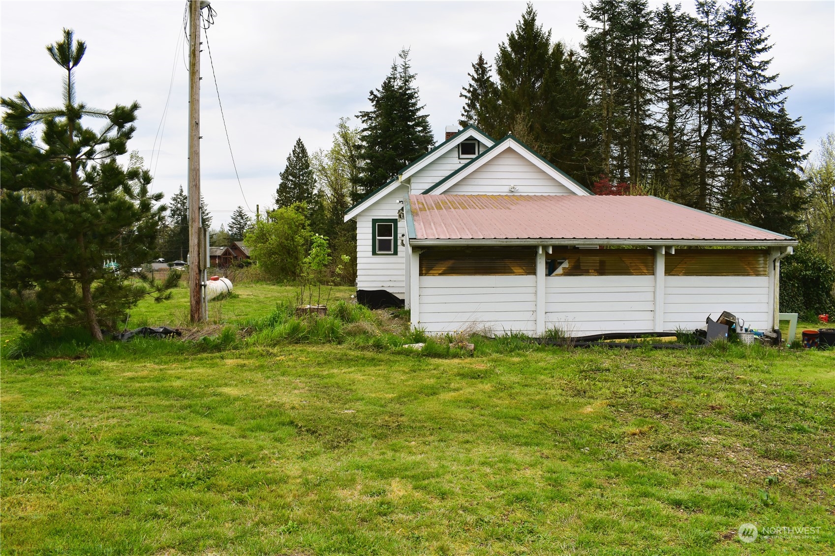 3370 Sweet Road Blaine, WA 98230 - Photo 5 of 20 a front view of a house with garden