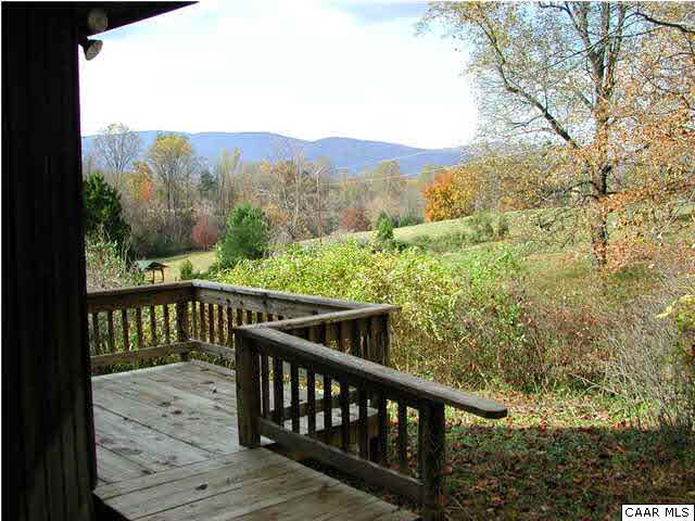 0 Gillums Ridge Road Charlottesville, VA 22903 - Photo 7 of 18 a view of a balcony with wooden floor and fence
