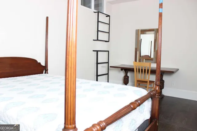 a kitchen view with table and chairs
