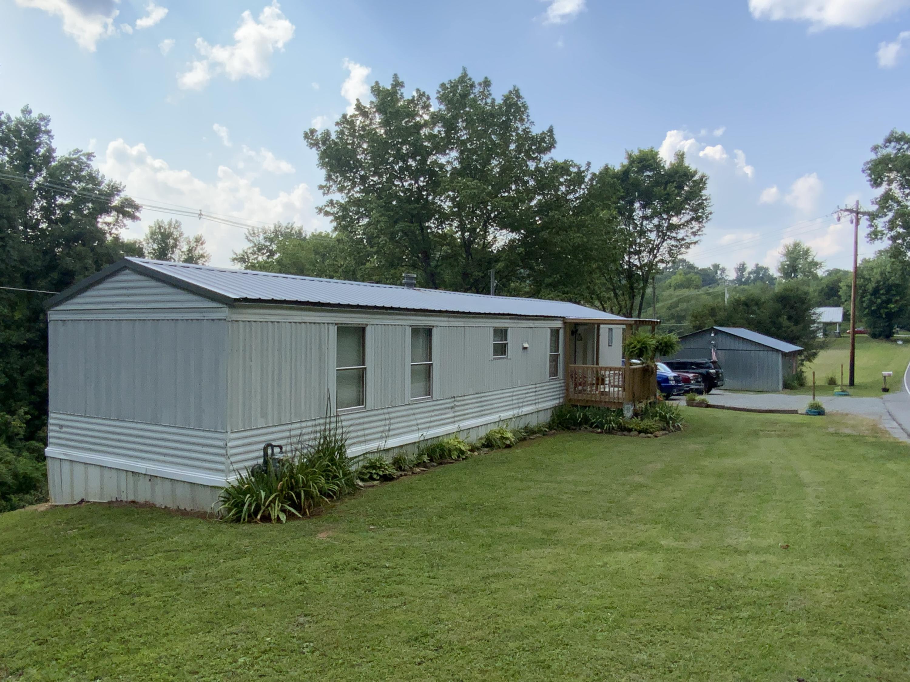 3303 Oak Grove Road Rocky Top, TN 37769 - Photo 2 of 29 04F84F46-4ECE-45D9-837A-761713DC54A9