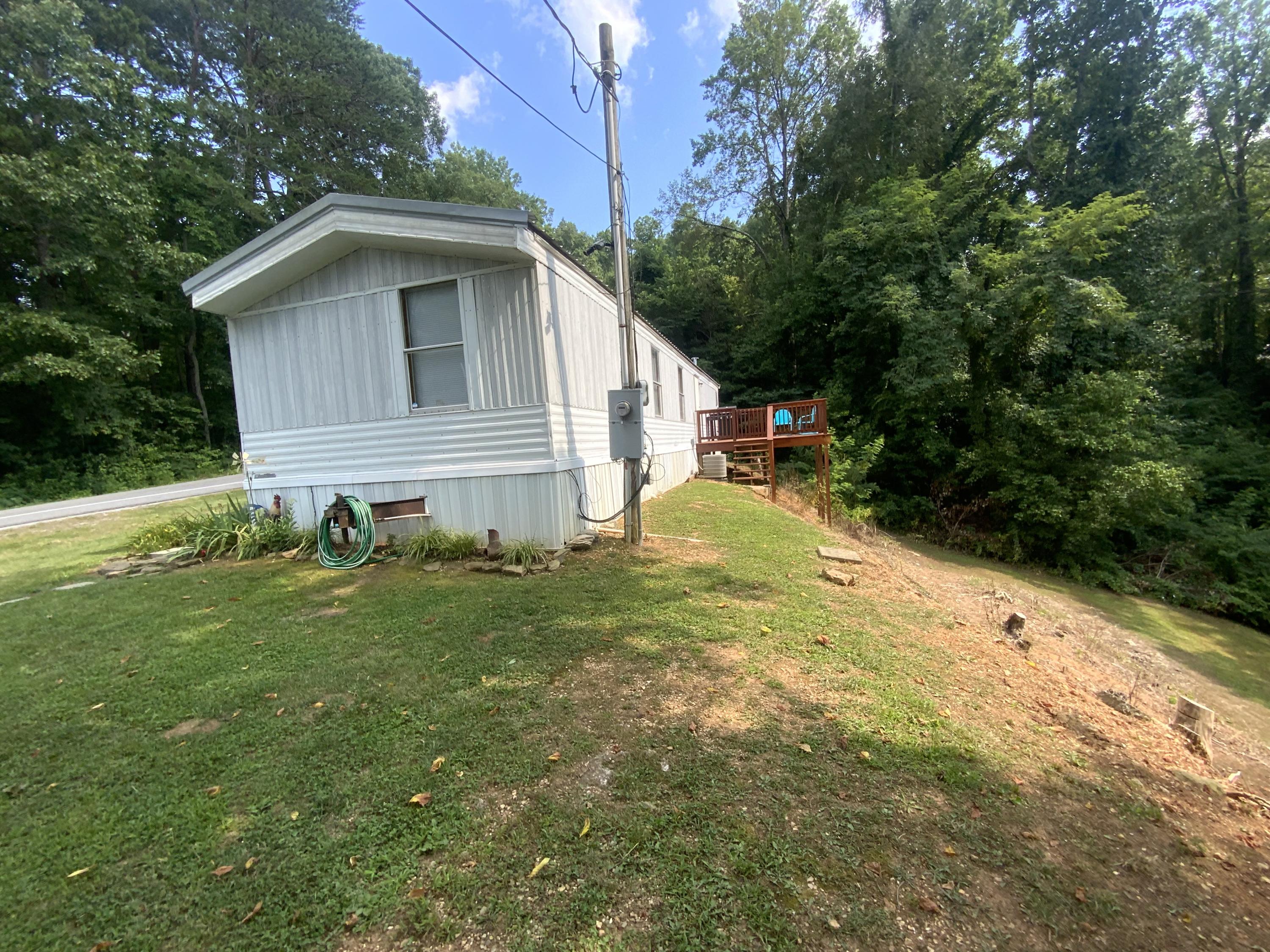 3303 Oak Grove Road Rocky Top, TN 37769 - Photo 7 of 29 5F0A8165-B2A1-46FD-AA03-0E983BE8AF54