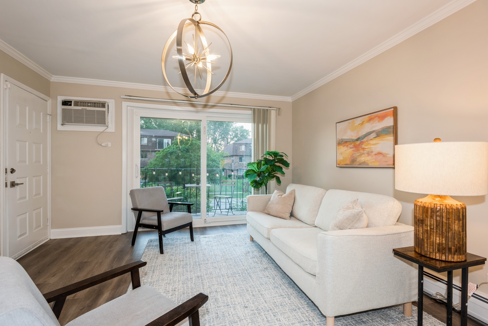 1212 Whispering Hills Court, Unit 2B Naperville, IL 60540 - Photo 2 of 10 a living room with furniture and a large window