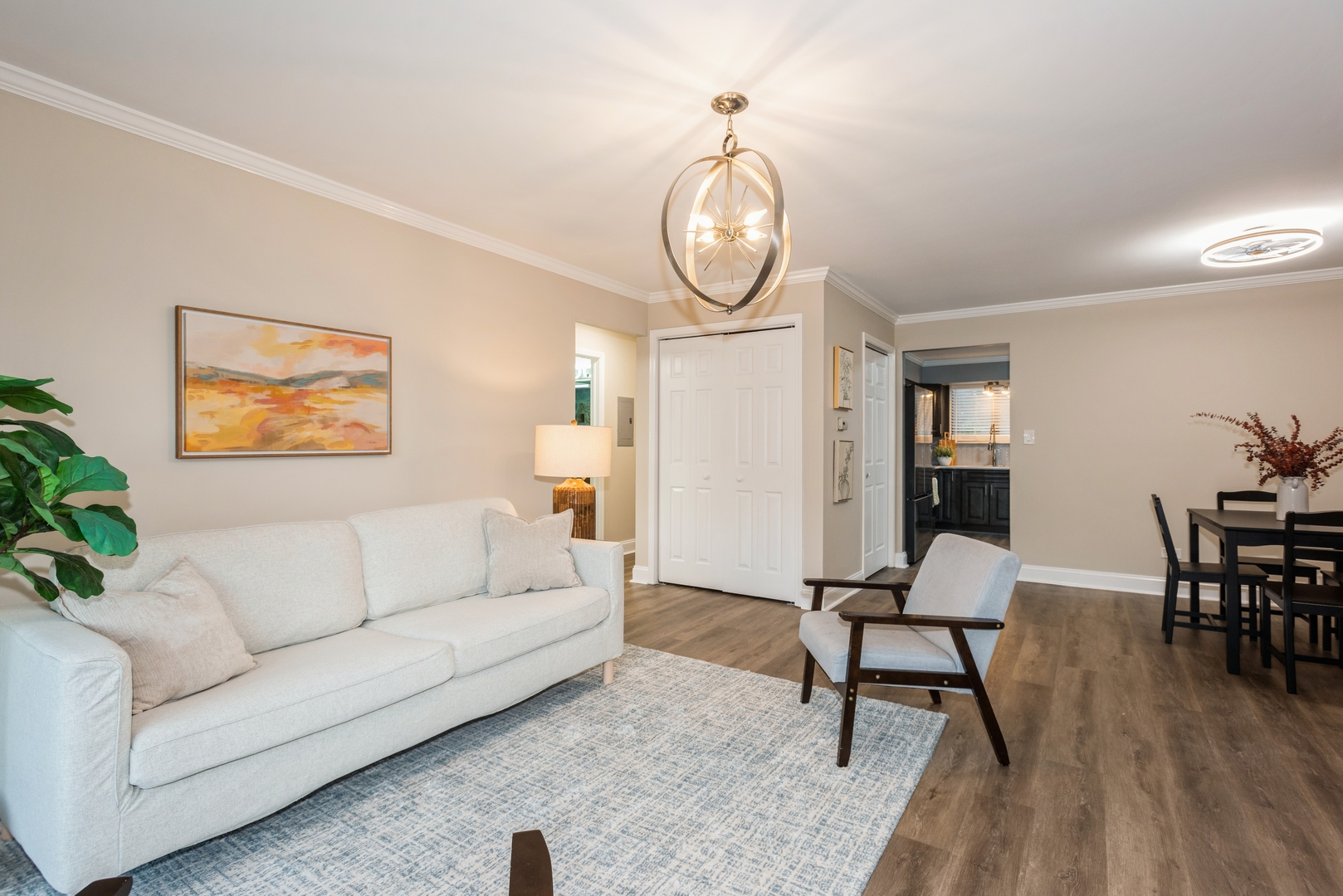1212 Whispering Hills Court, Unit 2B Naperville, IL 60540 - Photo 3 of 10 a living room with furniture a dining table with wooden floor