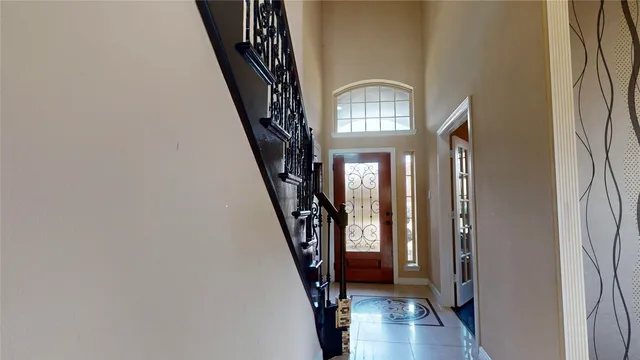 a view of entryway with wooden floor