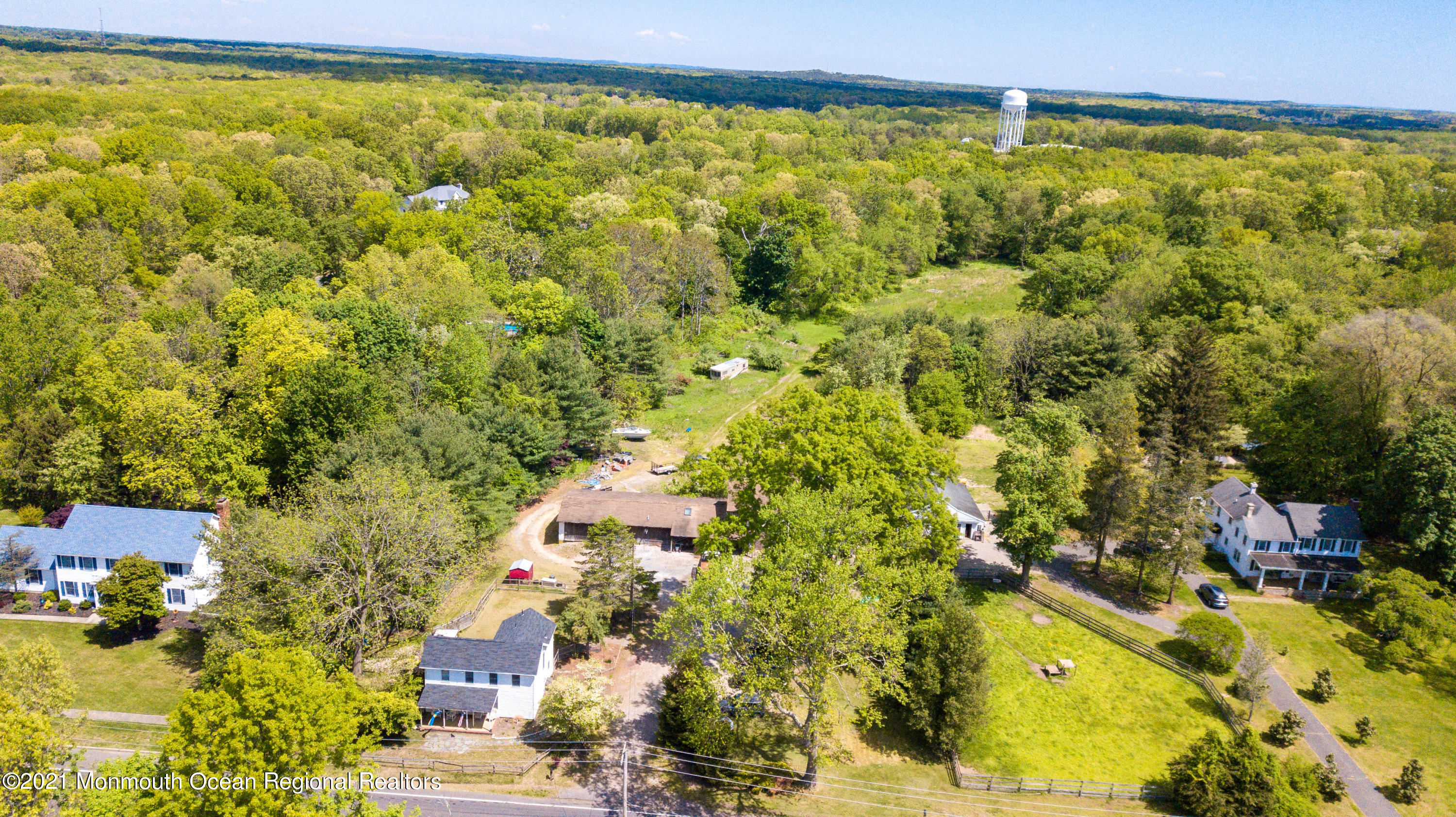 198 Adelphia Road Farmingdale, NJ 07727 - Photo 1 of 28 a view of an outdoor space and a lake view