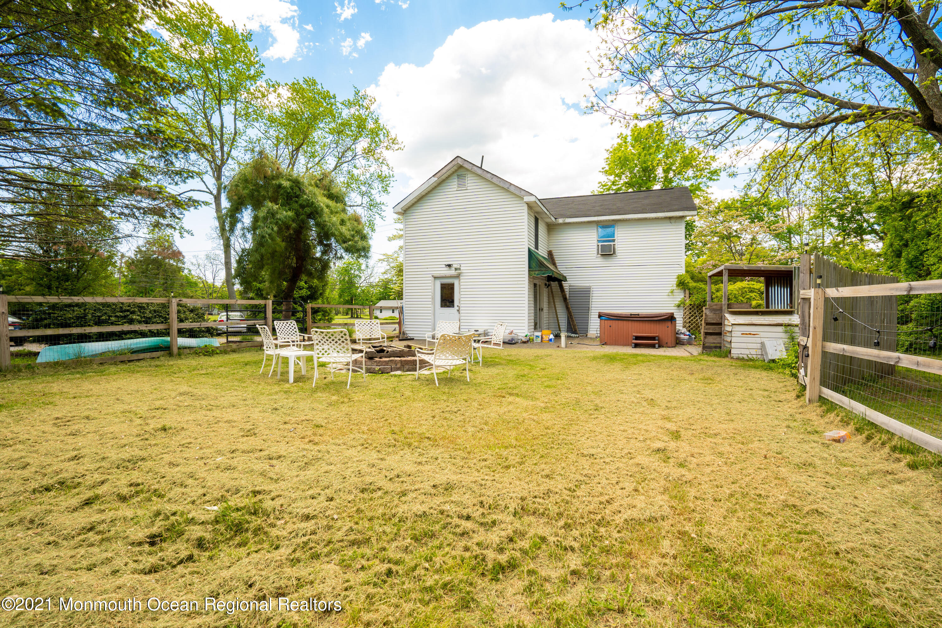 198 Adelphia Road Farmingdale, NJ 07727 - Photo 15 of 28 a swimming pool with outdoor seating and yard