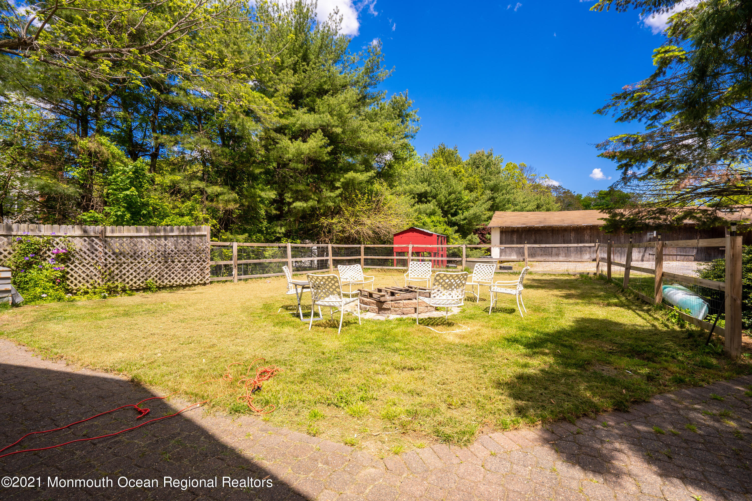 198 Adelphia Road Farmingdale, NJ 07727 - Photo 16 of 28 a view of a swimming pool with a patio