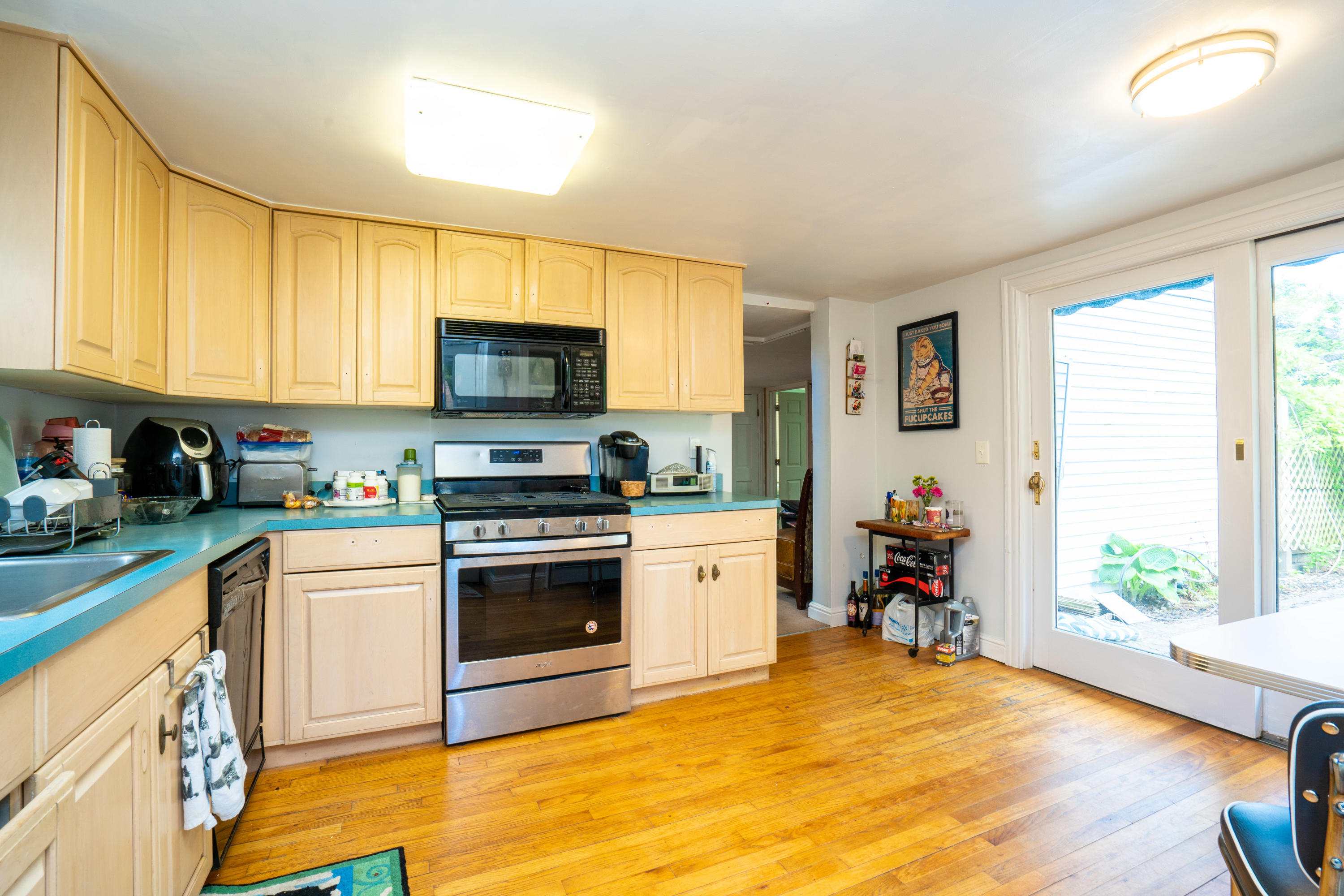 198 Adelphia Road Farmingdale, NJ 07727 - Photo 19 of 28 a kitchen with stainless steel appliances granite countertop a stove and a sink
