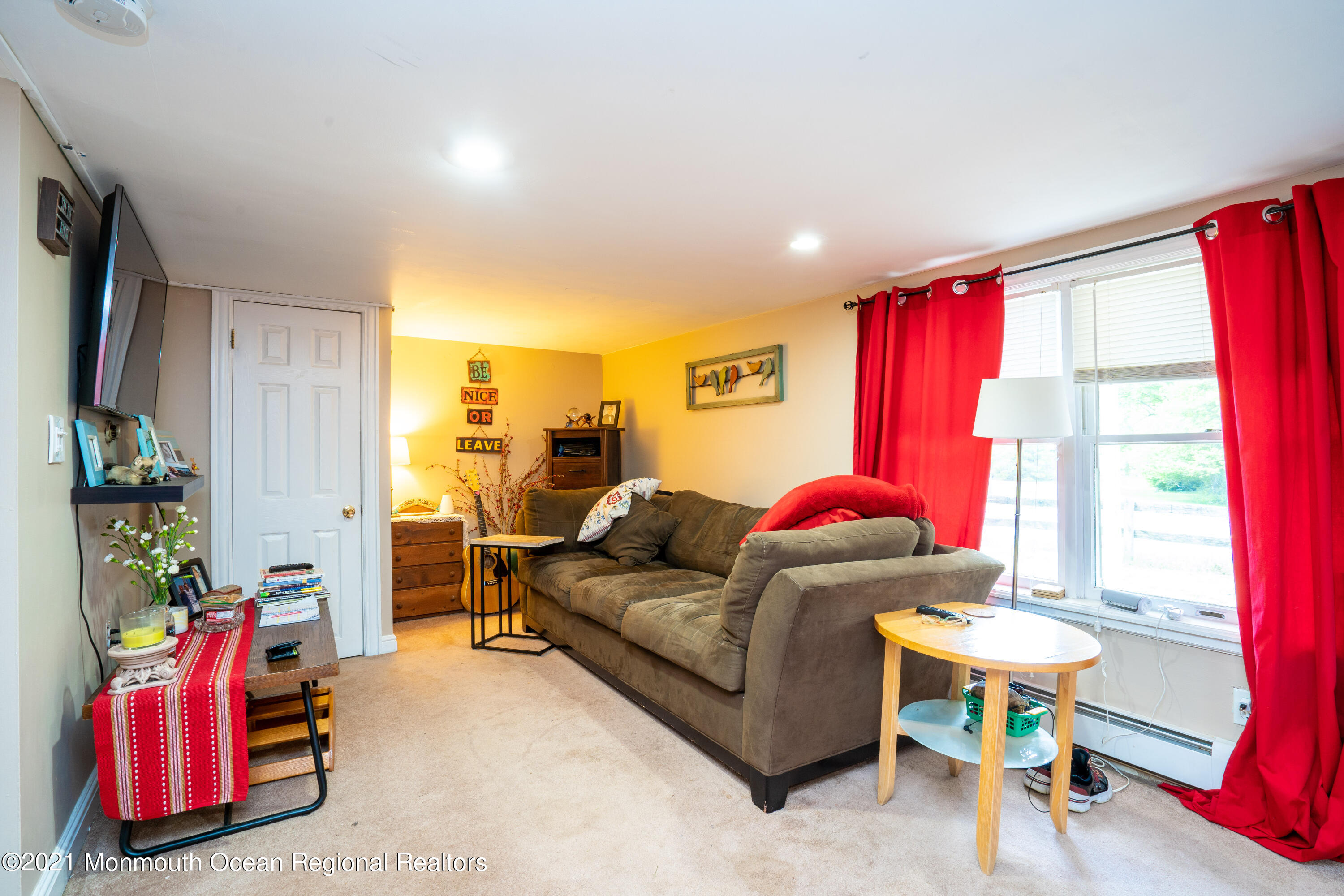 198 Adelphia Road Farmingdale, NJ 07727 - Photo 21 of 28 a living room with furniture and a window