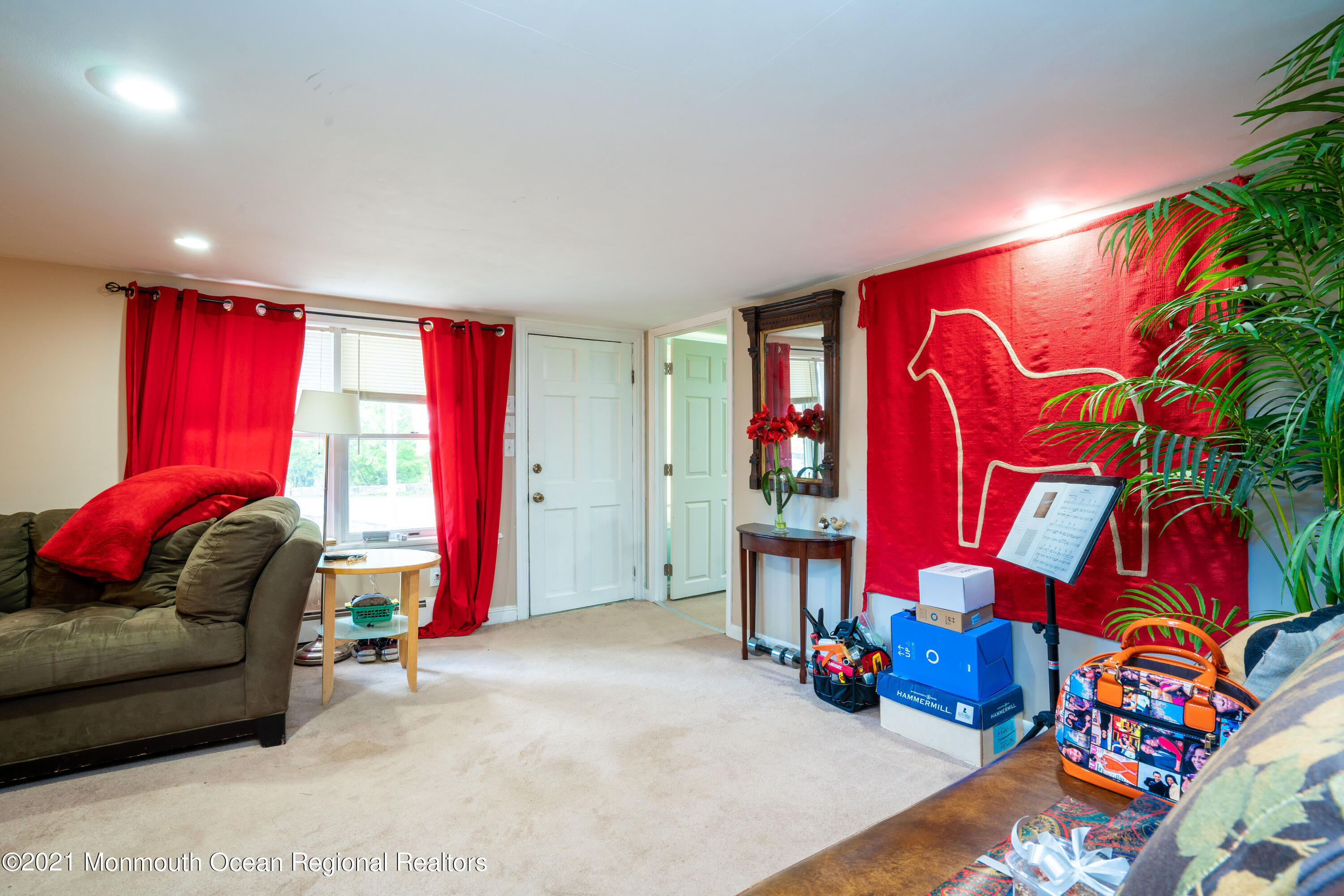 198 Adelphia Road Farmingdale, NJ 07727 - Photo 23 of 28 a bedroom with furniture and a lamp
