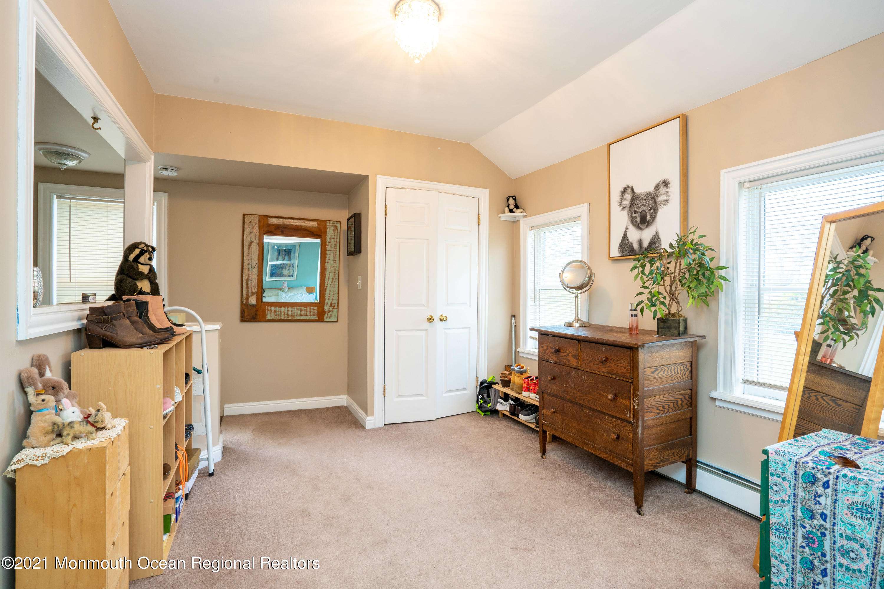 198 Adelphia Road Farmingdale, NJ 07727 - Photo 25 of 28 a living room with furniture and a couch