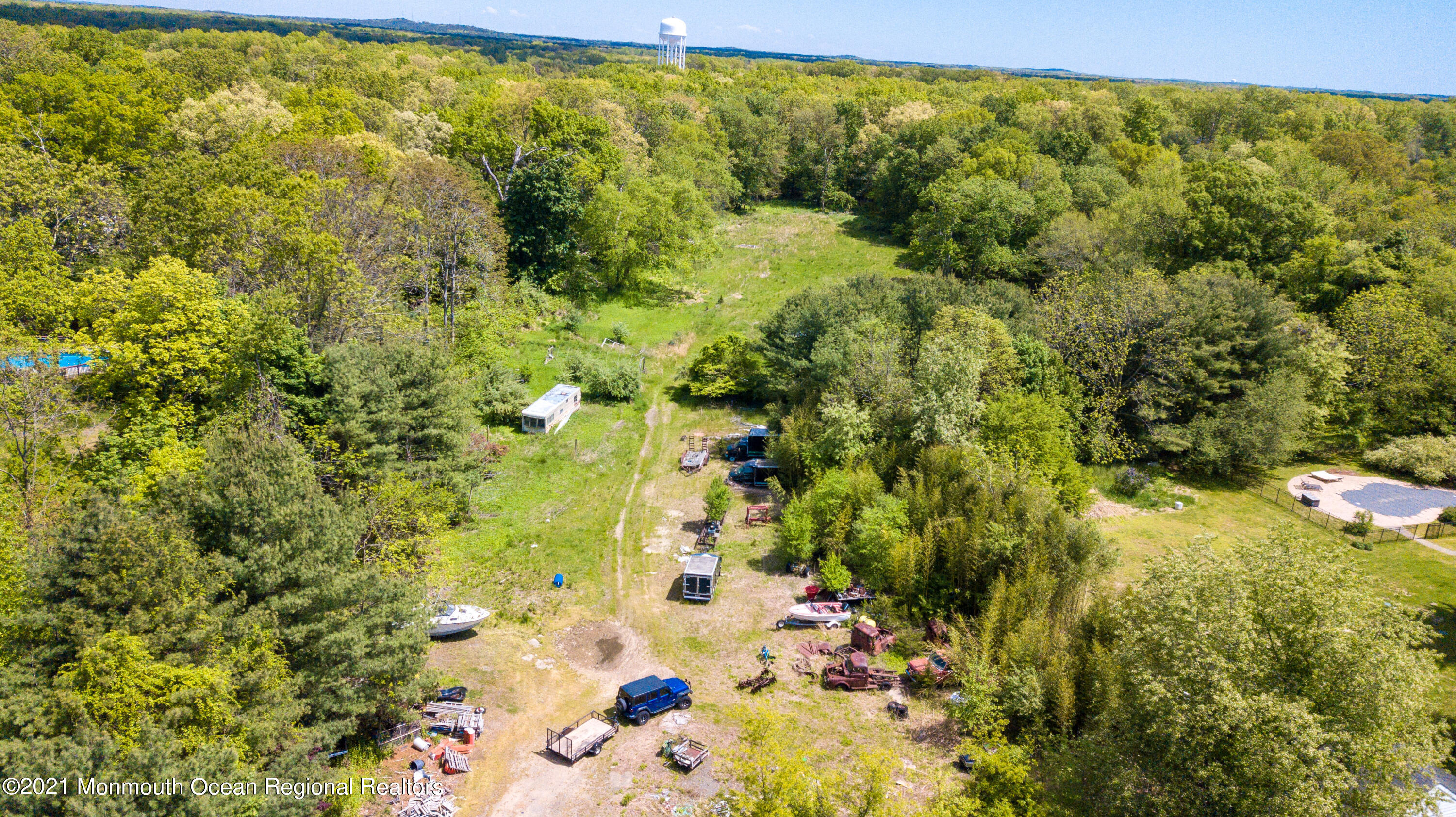 198 Adelphia Road Farmingdale, NJ 07727 - Photo 7 of 28 a view of a yard with an outdoor space
