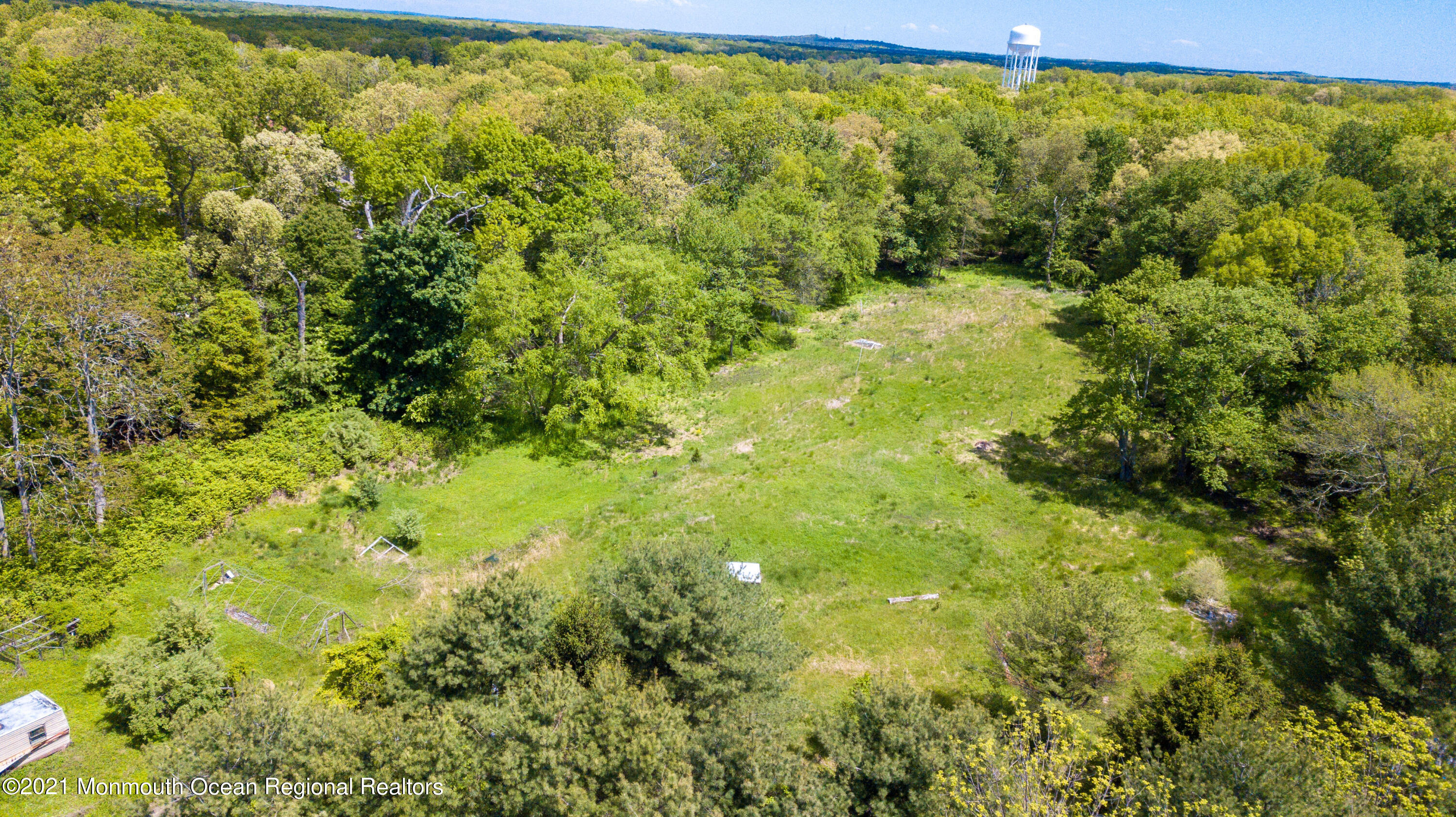 198 Adelphia Road Farmingdale, NJ 07727 - Photo 8 of 28 a view of a big yard with large trees