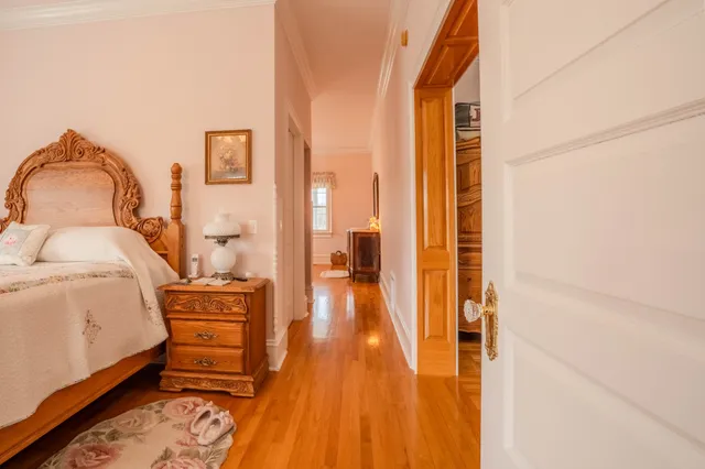 a spacious bathroom with a double vanity sink and a mirror