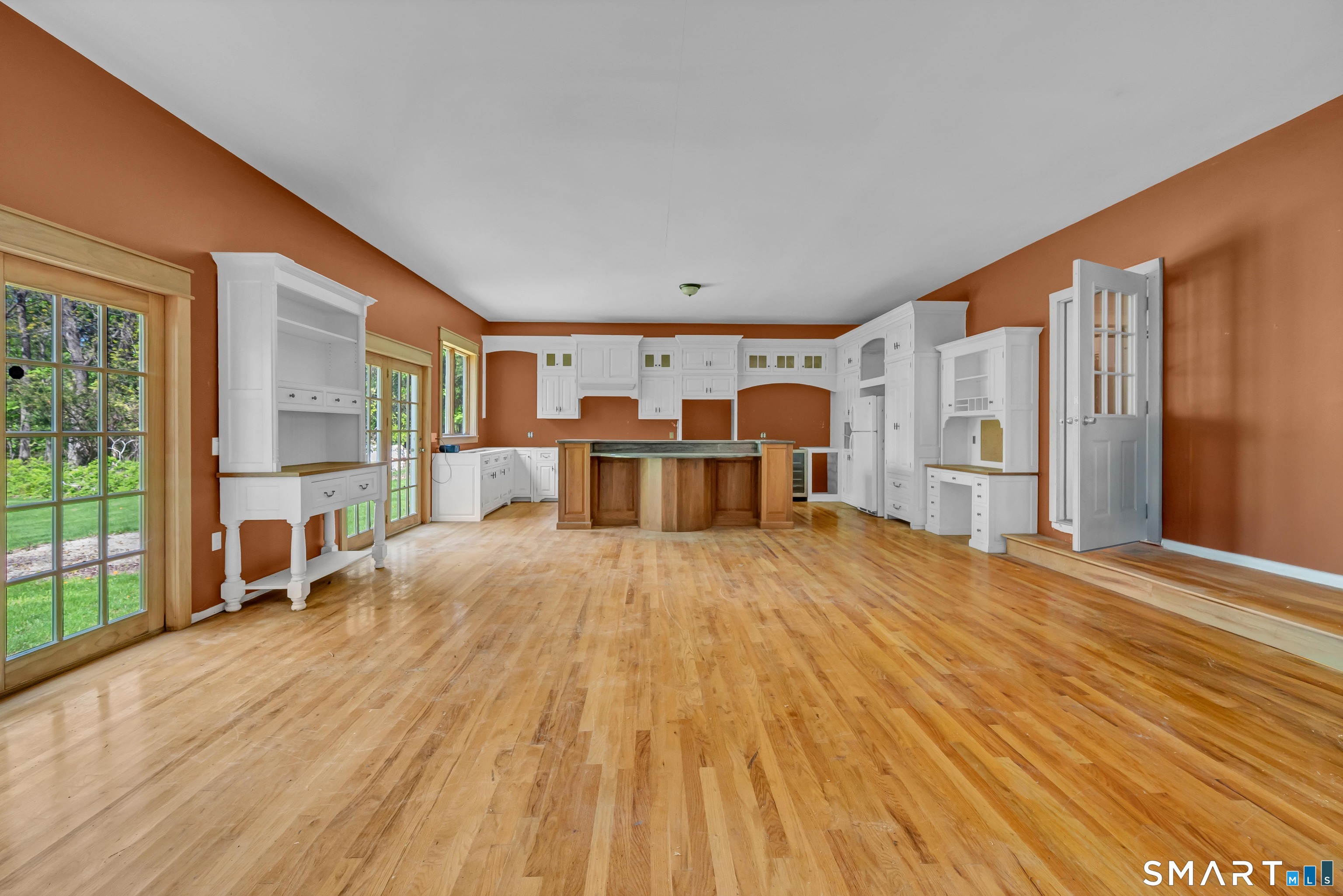 30 Whisconier Road Brookfield, CT 06804 - Photo 12 of 39 a large room with wooden floor and windows