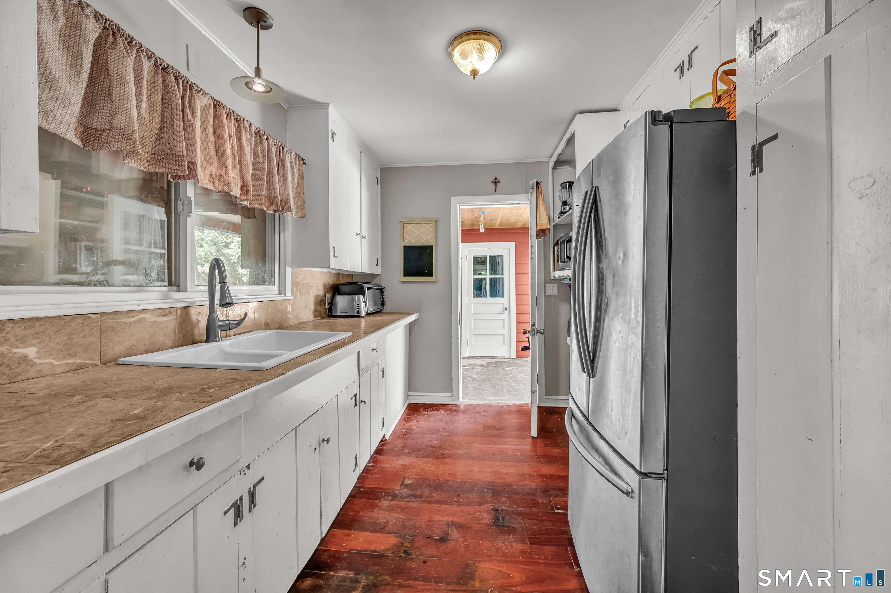 30 Whisconier Road Brookfield, CT 06804 - Photo 18 of 39 a large kitchen with stainless steel appliances granite countertop a refrigerator and a sink
