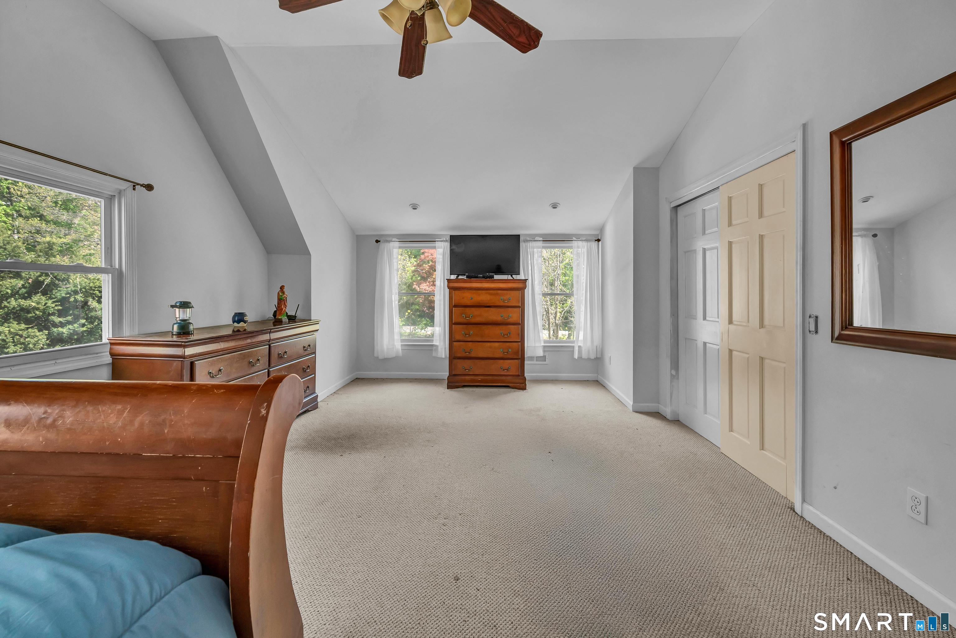 30 Whisconier Road Brookfield, CT 06804 - Photo 22 of 39 a living room with furniture and a window