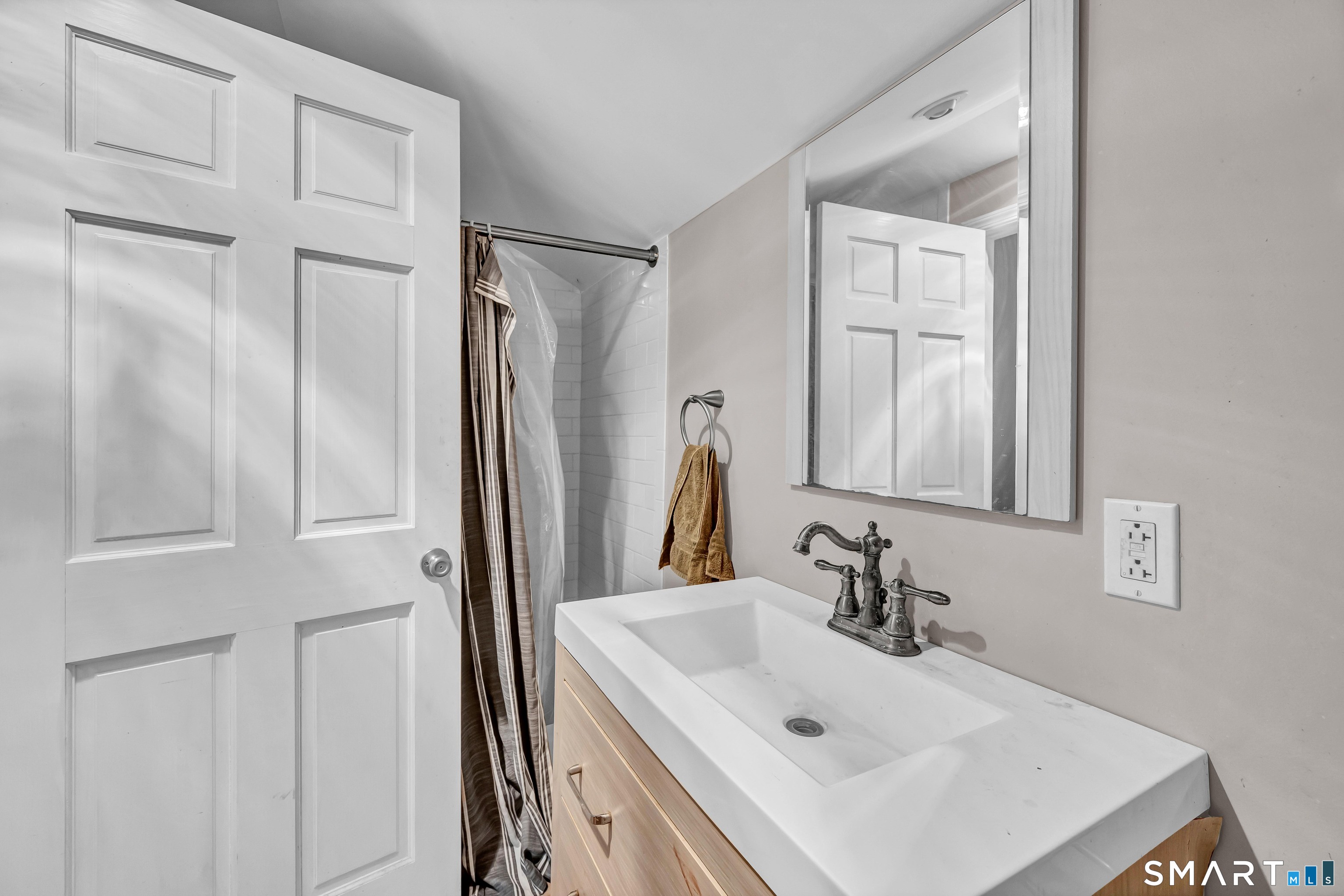 30 Whisconier Road Brookfield, CT 06804 - Photo 29 of 39 a bathroom with a sink and a mirror