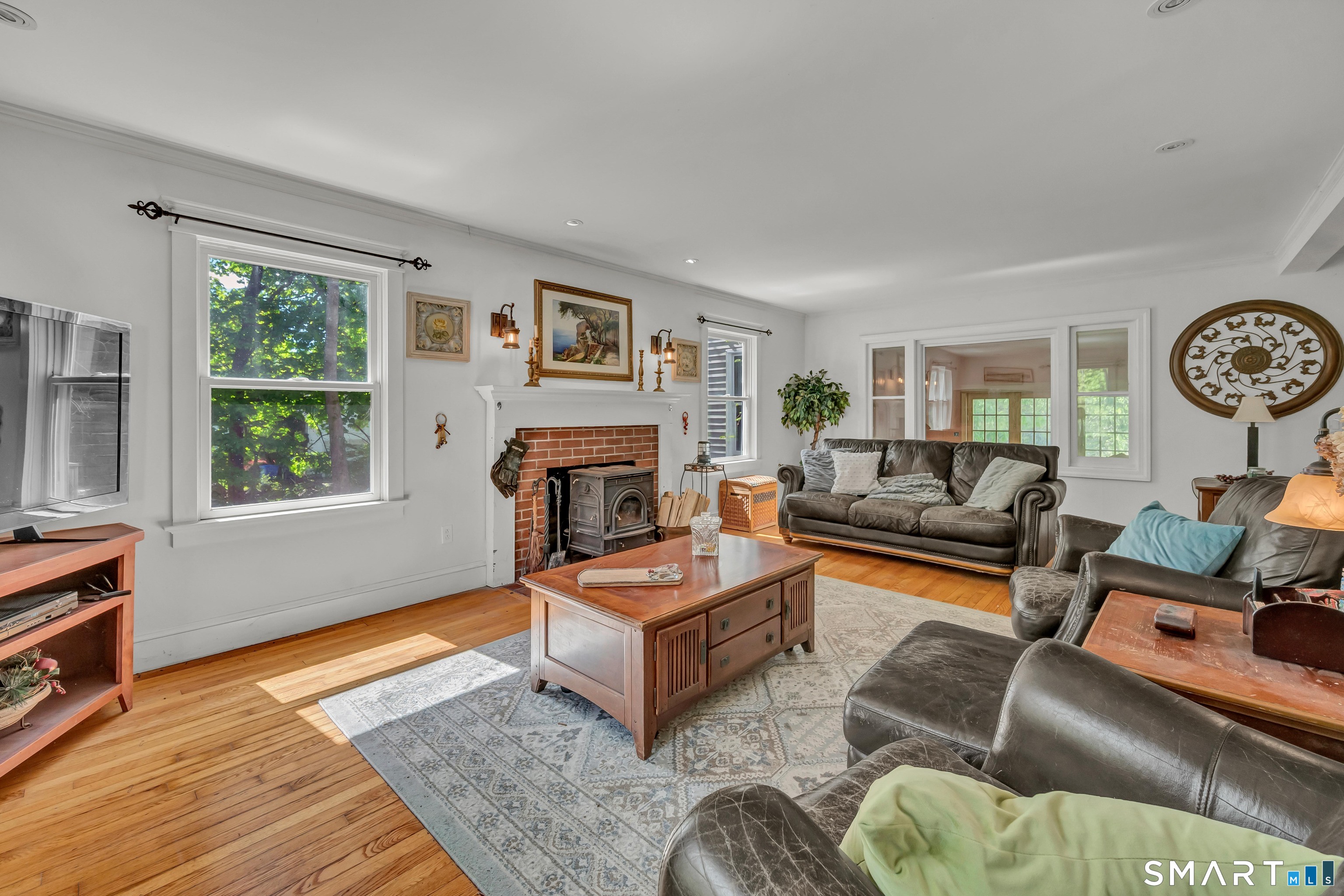 30 Whisconier Road Brookfield, CT 06804 - Photo 3 of 39 a living room with furniture and a fireplace