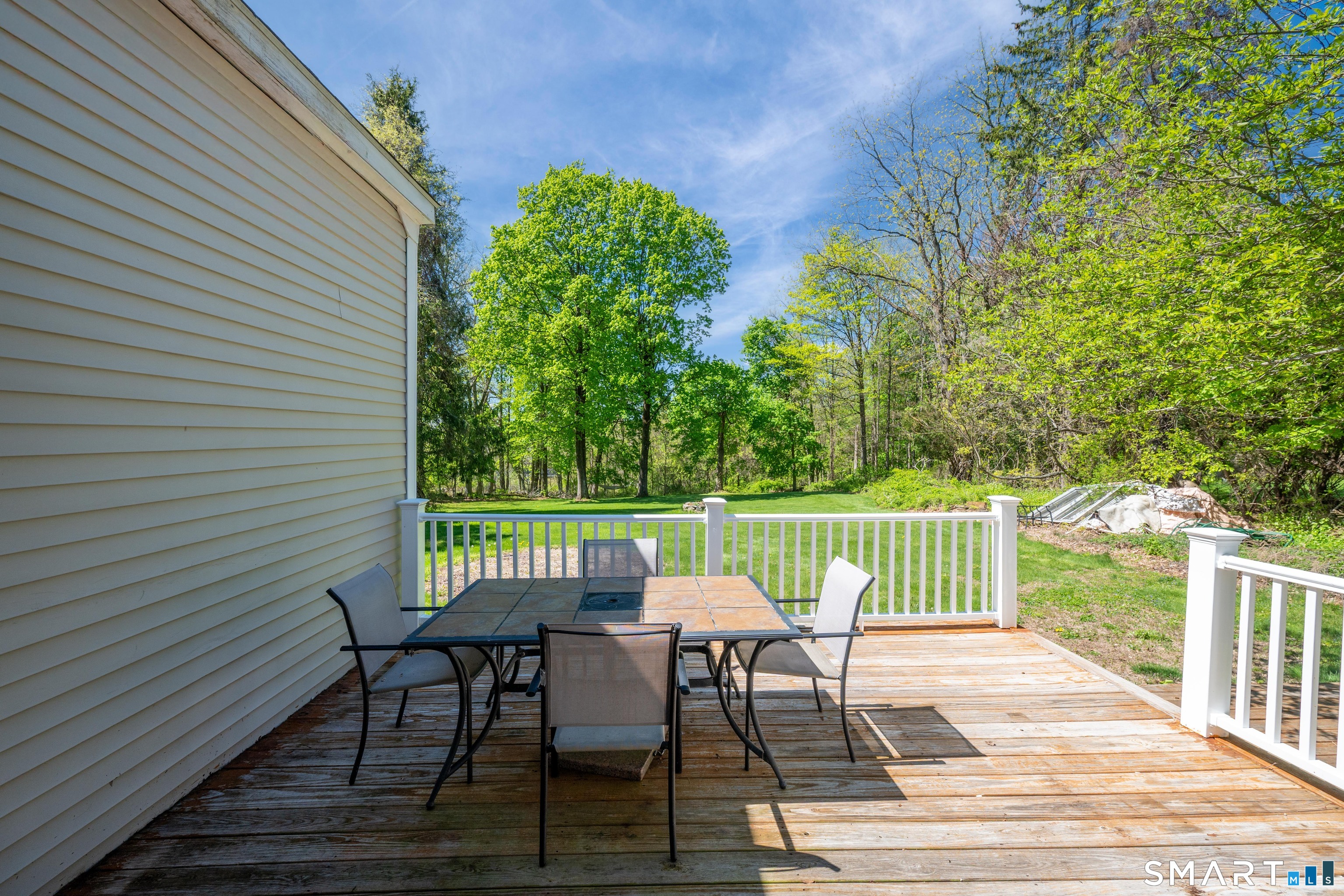 30 Whisconier Road Brookfield, CT 06804 - Photo 31 of 39 a view of a chairs and table on the deck