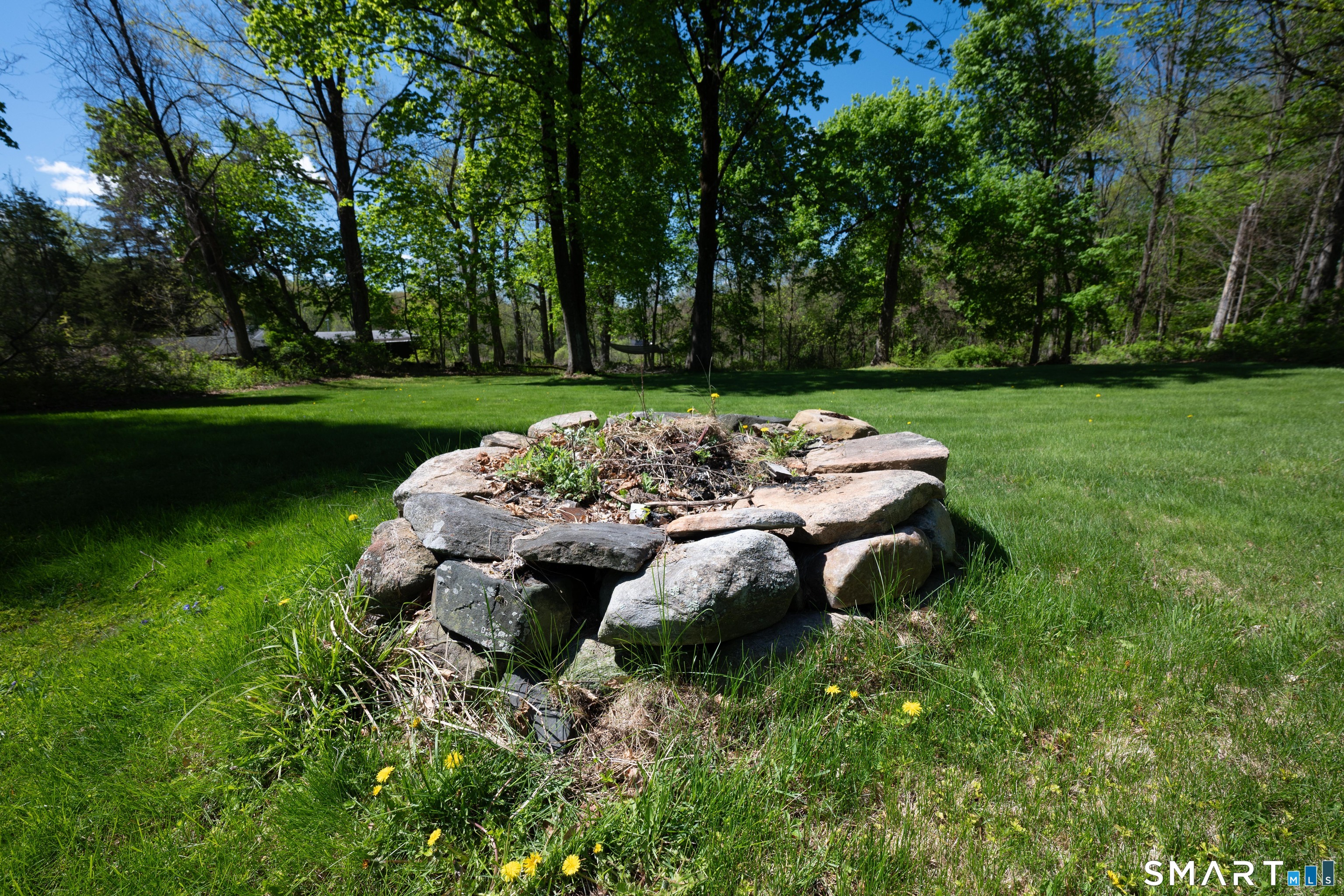 30 Whisconier Road Brookfield, CT 06804 - Photo 36 of 39 a view of a garden with lawn chairs