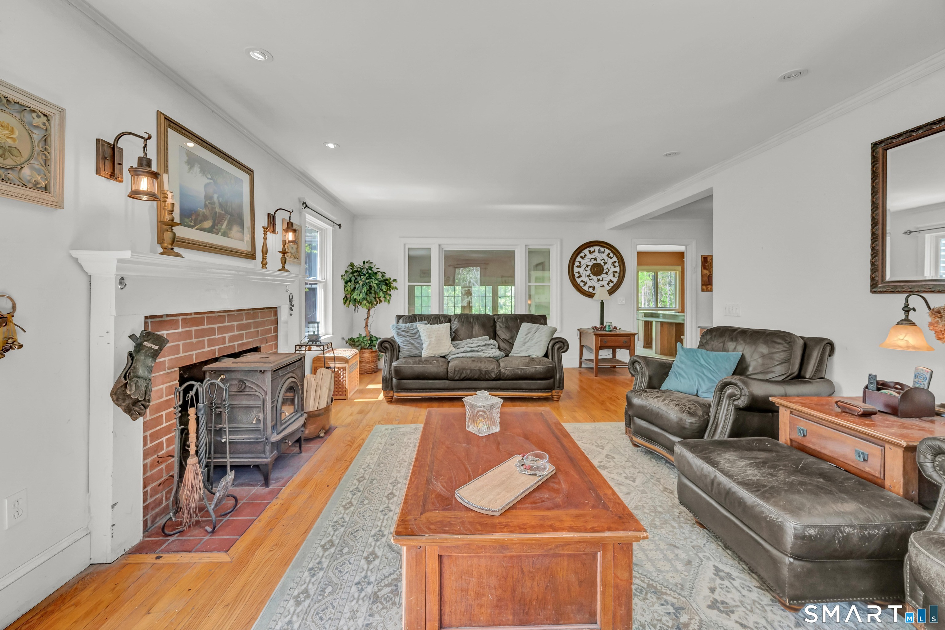 30 Whisconier Road Brookfield, CT 06804 - Photo 4 of 39 a living room with furniture and a fireplace