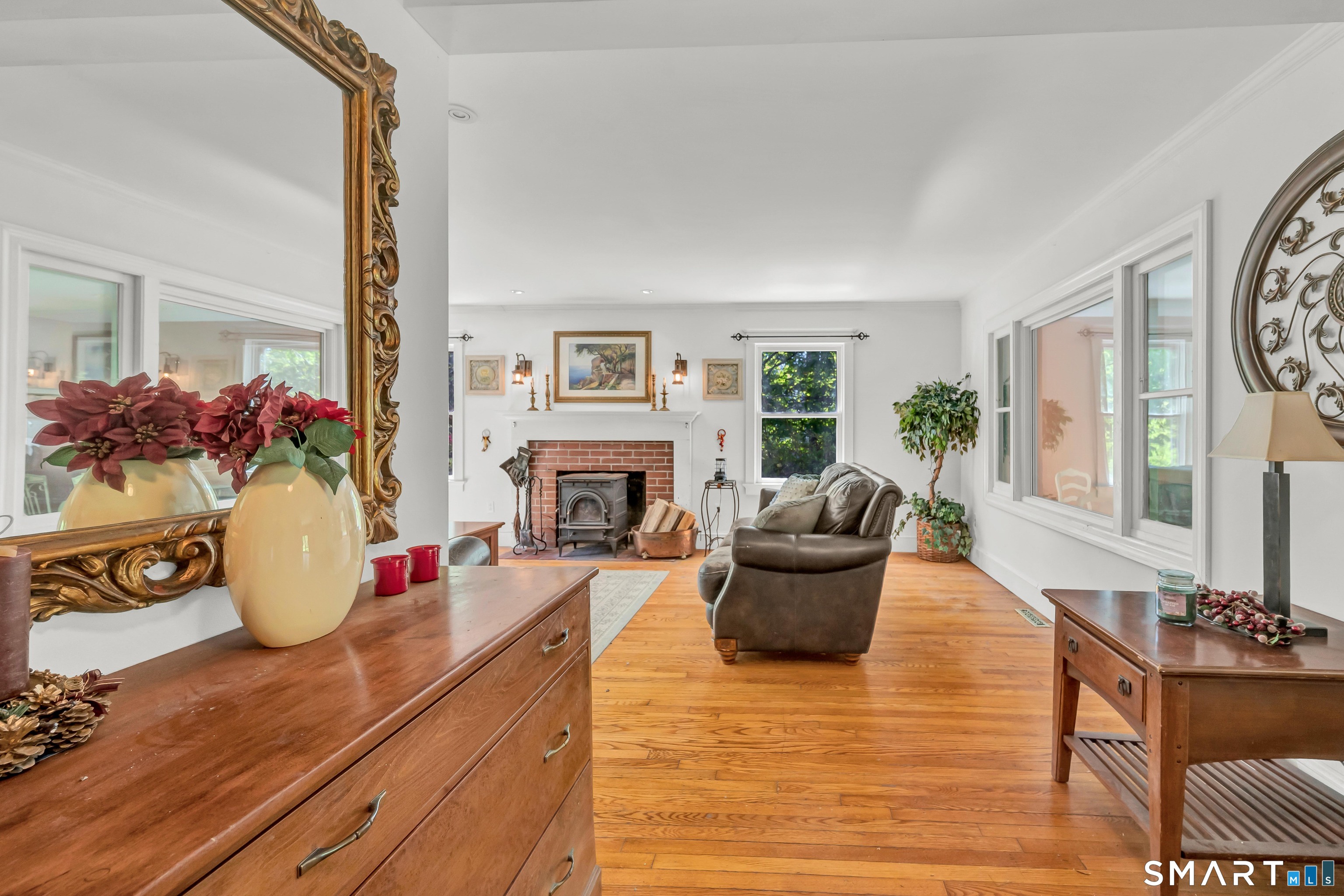 30 Whisconier Road Brookfield, CT 06804 - Photo 5 of 39 a living room with furniture and a fireplace