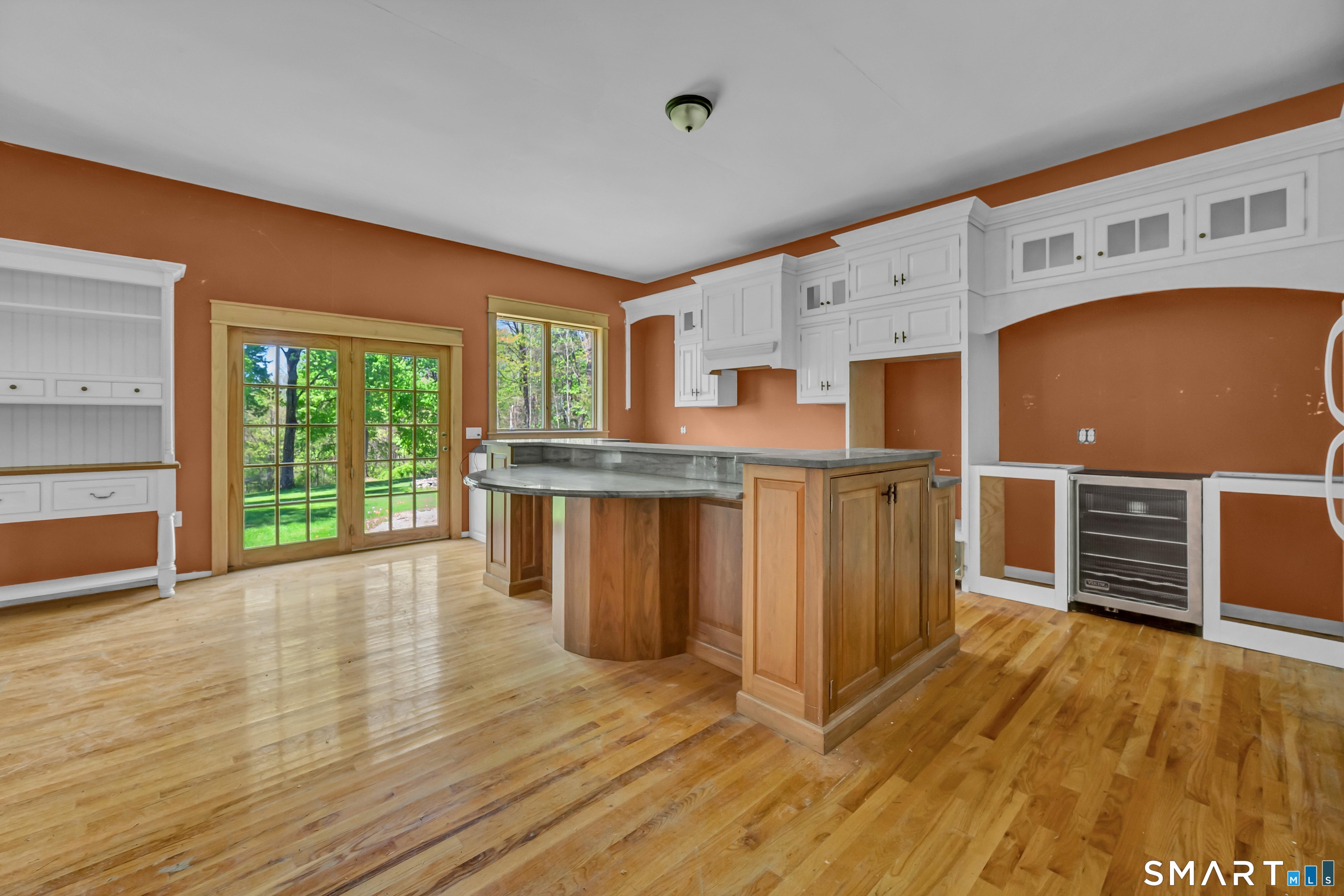 30 Whisconier Road Brookfield, CT 06804 - Photo 8 of 39 a open kitchen with stainless steel appliances granite countertop a stove and a wooden floors