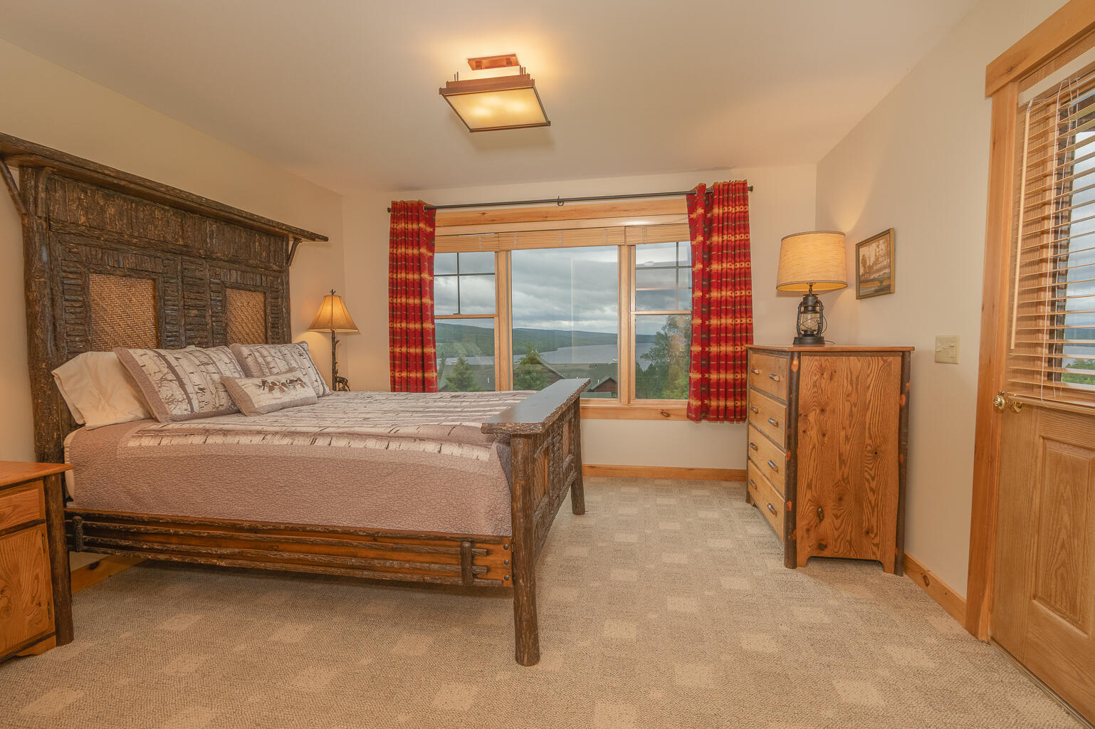 26 Whip Willow Farm Road, Unit 10 Rangeley, ME 04970 - Photo 19 of 35 Lower level primary bedroom