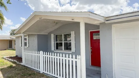 a front view of a house with a porch