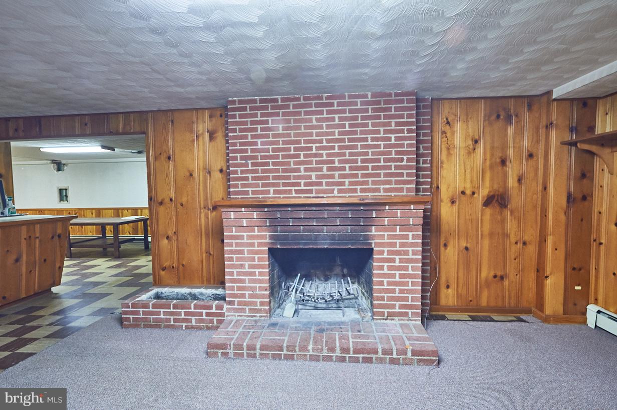 4912 Sharon Road Temple Hills, MD 20748 - Photo 18 of 25 basement fireplace