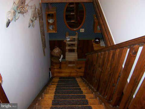 2382 Harvey Gummel Road Hampstead, MD 21074 - Photo 12 of 30 Stairs to/from 2nd level of Main House to Kitchen