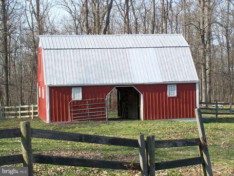 2382 Harvey Gummel Road Hampstead, MD 21074 - Photo 24 of 30 Barn with 3 stalls and tack room